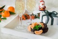 Champagne, chocolate, tangerines and Santa Claus.