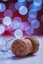 champagne corck on white table and blurred background with bokeh Royalty Free Stock Photo