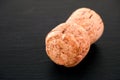 Champagne cork on black background Royalty Free Stock Photo