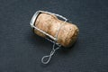 Champagne cork on black Royalty Free Stock Photo
