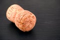 Champagne cork on black stone background Royalty Free Stock Photo