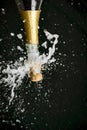 a champagne cork is popping out Royalty Free Stock Photo