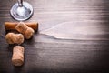 Champagne corks with corkscrew on vintage wooden Royalty Free Stock Photo