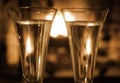 Champagne by the fire Royalty Free Stock Photo