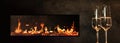 Champagne by the fireplace fire Royalty Free Stock Photo