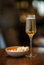 Champagne Flute and Popcorn Bowl in Night Time Royalty Free Stock Photo