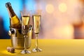 Champagne flutes and chilled bottle. Royalty Free Stock Photo