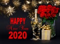 Champagne gift flowers golden fireworks Happy New Year 2020 Royalty Free Stock Photo