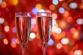 Champagne glass close up on Christmas and New Year holiday bokeh background Royalty Free Stock Photo