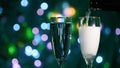 Champagne glass close up on Christmas and New Year holiday bokeh background Royalty Free Stock Photo