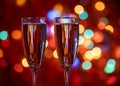 Champagne glass close up on Christmas and New Year holiday bokeh background Royalty Free Stock Photo