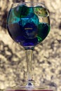 Champagne glass with a colorful glass balls with liquid inside. Abstract decorative element for restaurant and cafe menu or web Royalty Free Stock Photo