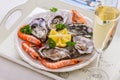 Champagne glass, oysters shell with shrimp on serving tray Royalty Free Stock Photo