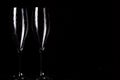 Champagne glasses on black spray Royalty Free Stock Photo