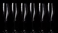 Champagne glasses on black spray Royalty Free Stock Photo