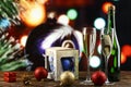 Champagne in glasses and in a bottle and toys on the Christmas tree on the background of bokeh. christmas background. space for Royalty Free Stock Photo