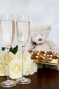Champagne Glasses, Box of Chocolate, Bunch of White Roses and Te Royalty Free Stock Photo