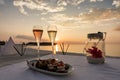 Champagne glasses and canapes on a tropical beach setting