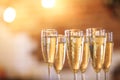 Champagne glasses on gold background. Party concept