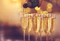 Champagne glasses on gold background. Party concept Royalty Free Stock Photo