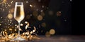 Champagne glasses with golden champagne on a dark background and golden bokeh. Royalty Free Stock Photo