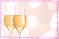 Champagne glasses with hearts and Blurred background