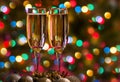 Champagne glasses on New Year`s Eve. Merry christmas and a happy new year Royalty Free Stock Photo