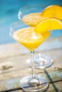 Champagne glasses with orange slice Mimosa cocktail Royalty Free Stock Photo