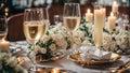 Champagne glasses, plate, flowers, candles dinner decor table event wedding party Royalty Free Stock Photo