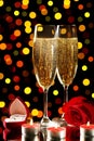 Champagne glasses with rose, candles Royalty Free Stock Photo