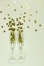 champagne glasses strewn s white background isolate