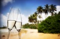 Champagne glasses on tropical beach - exotic New Year Royalty Free Stock Photo