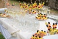 Champagne glasses and various snacks for consumption after the wedding ceremony Royalty Free Stock Photo