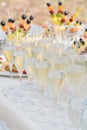 Champagne glasses and various snacks for consumption after the wedding ceremony Royalty Free Stock Photo