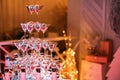 Champagne glasses. Wedding slide champagne for bride and groom. Colorful wedding glasses with champagne. Catering service. Caterin