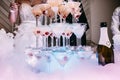 Champagne glasses. Wedding slide champagne for bride and groom. Colorful wedding glasses with champagne. Catering service. Caterin