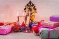Champagne in glasses on wooden table with colorful Christmas presents Royalty Free Stock Photo