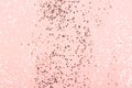 Champagne gold confetti on pink background