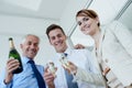 Champagne, portrait or happy business people at office party in celebration of target or success. Bottle, low angle and Royalty Free Stock Photo