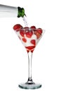 Champagne poured in to the glass with strawberry