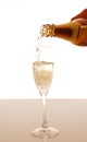 Champagne pouring into elegant glass