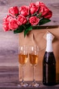 Champagne, rose and a lovely message on the table Royalty Free Stock Photo