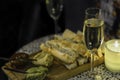 Champagne served with sliced focaccia with different spreads