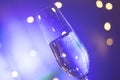 Champagne glass in disco party bar Royalty Free Stock Photo