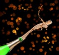 Champagne splashing out of bottle on background Royalty Free Stock Photo