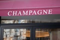 A champagne text sign french wine on wall store entrance facade shop