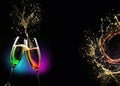 Champaign splash into two glasses Royalty Free Stock Photo