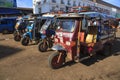 Champasak Laos - Nov23- group of three wheel vehicle queue in D