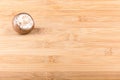 Champignon mushroom in the upper corner and empty wooden background for text Royalty Free Stock Photo