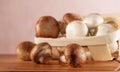 Champignon mushrooms in wooden basket Royalty Free Stock Photo